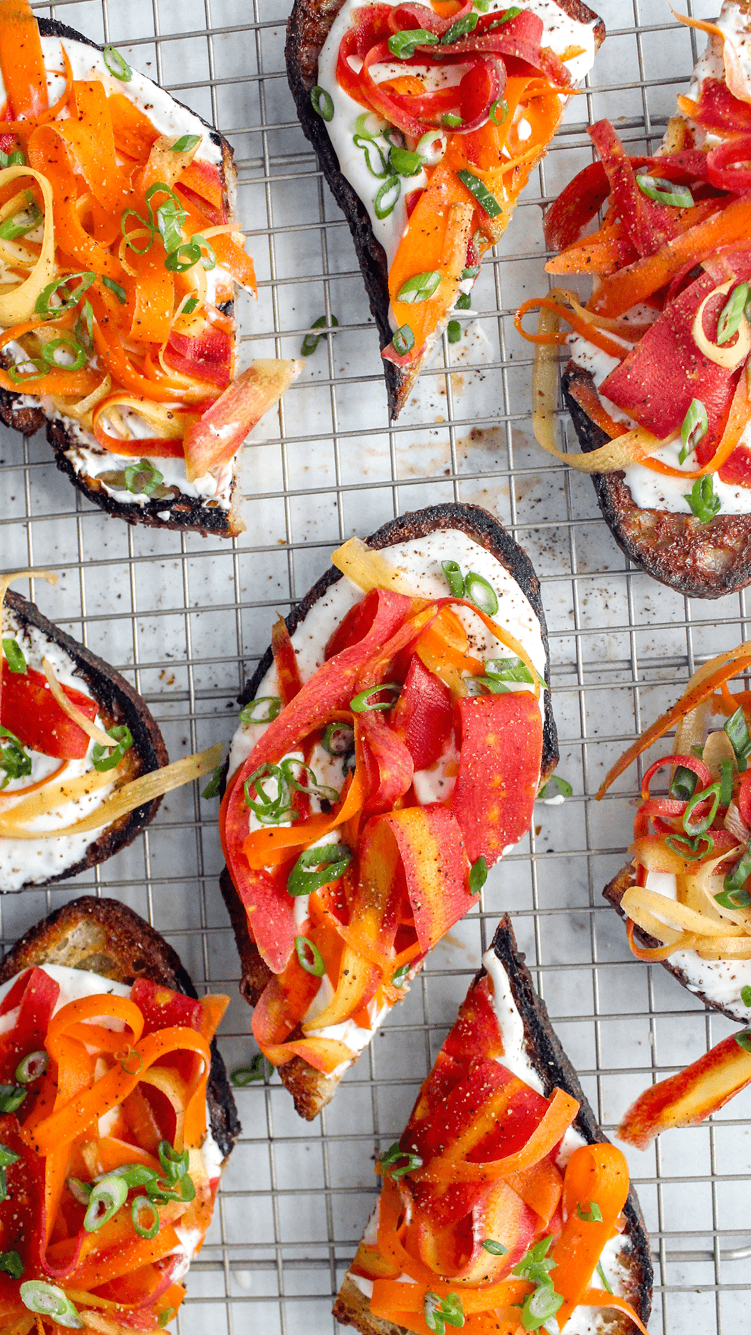 close up of miso cream cheese carrot crostinis