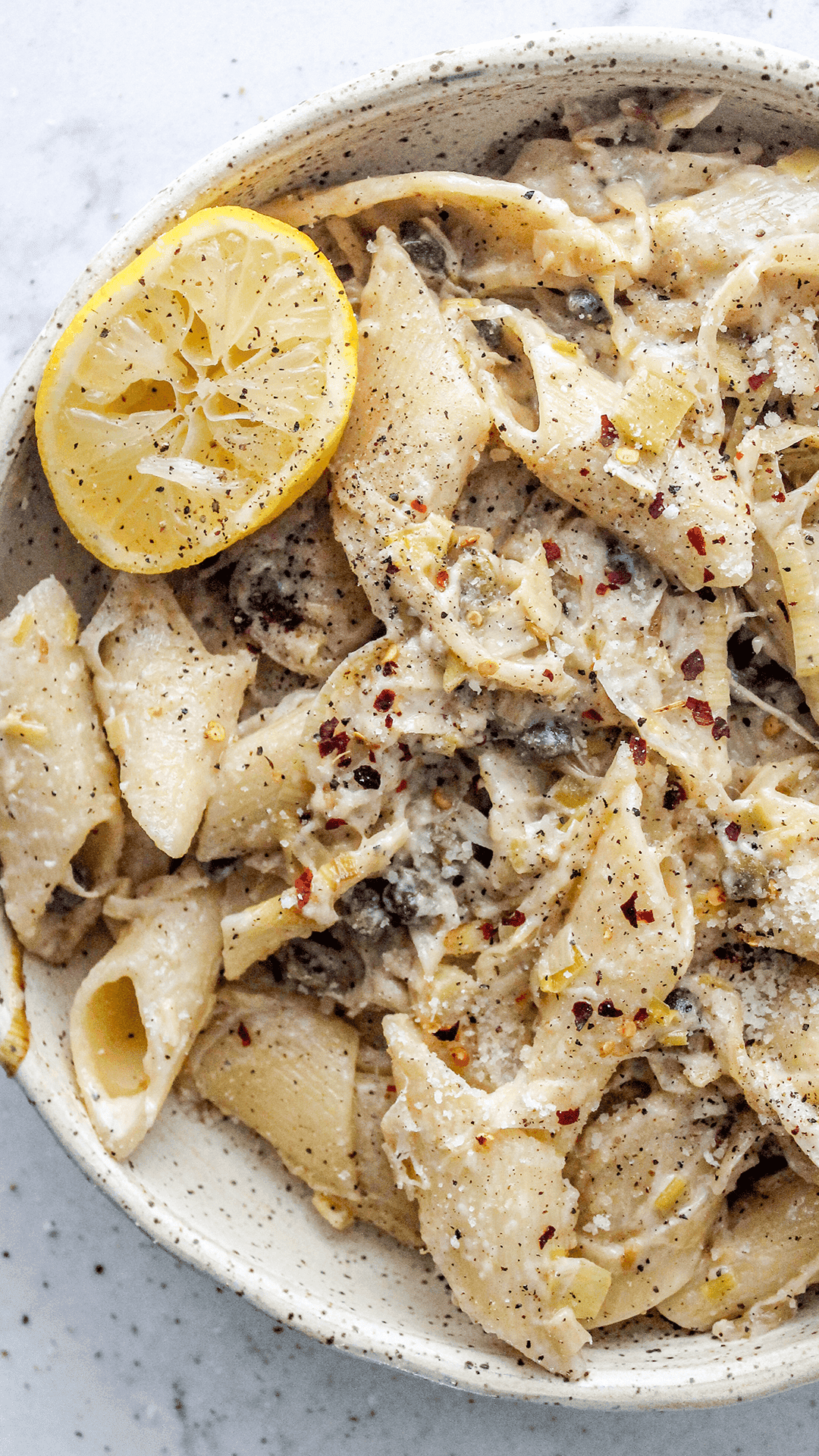 close up of caramelized leek pasta