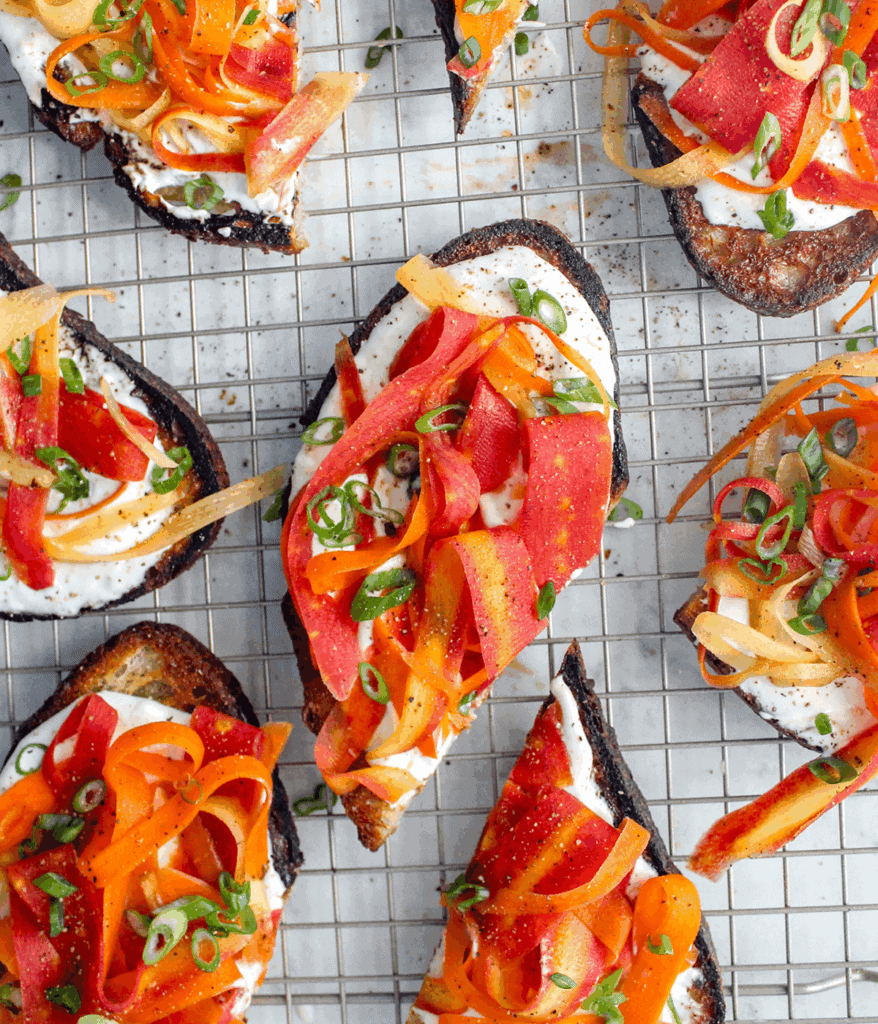 a bunch of miso cream cheese carrot crostinis