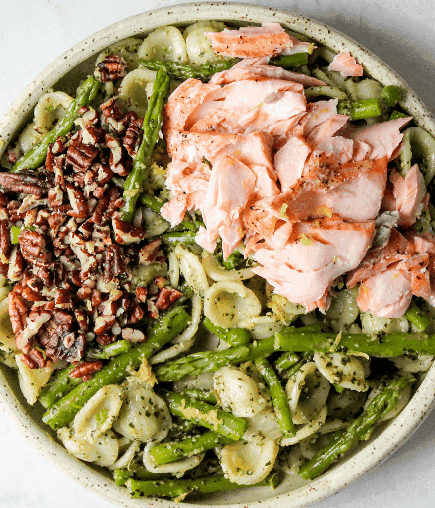 ingredients for salmon pesto pasta before mixing in a bowl. 