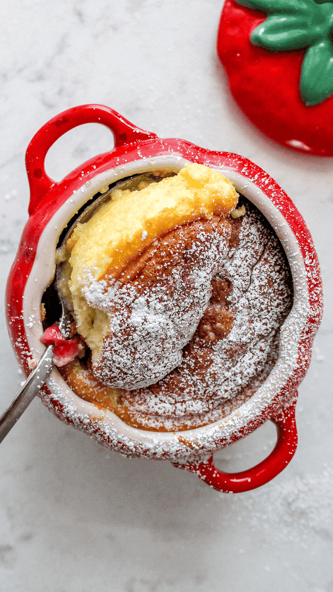 scoop of cocotte lemon pudding cake