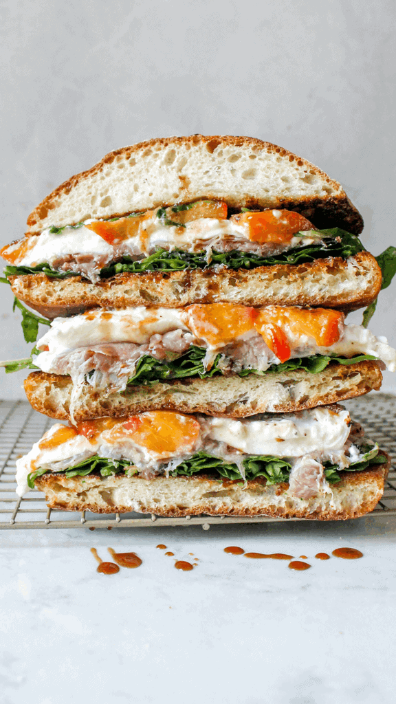 stack of peach and burrata sandwich