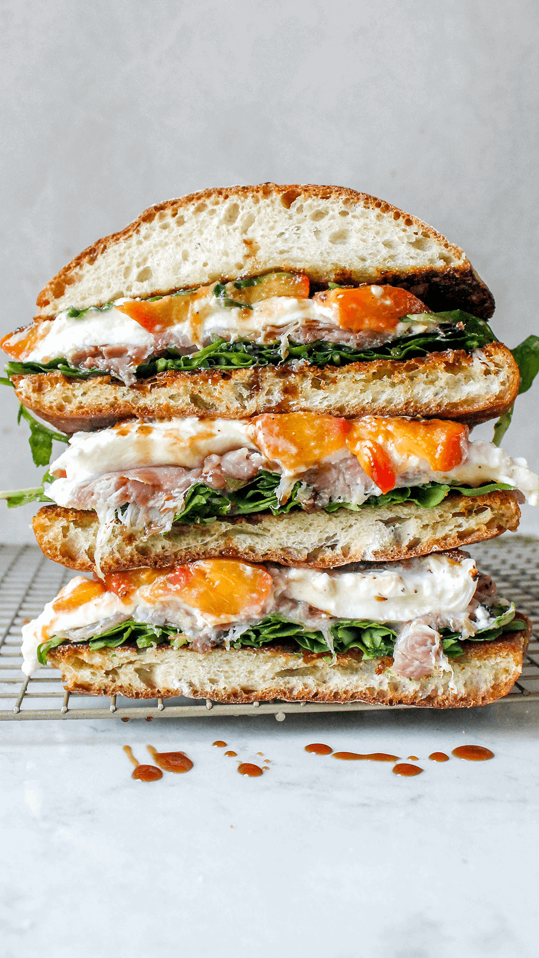 stack of peach and burrata sandwich