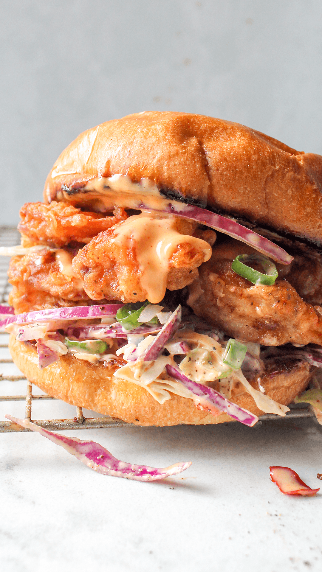 stacked fried shrimp sandwich